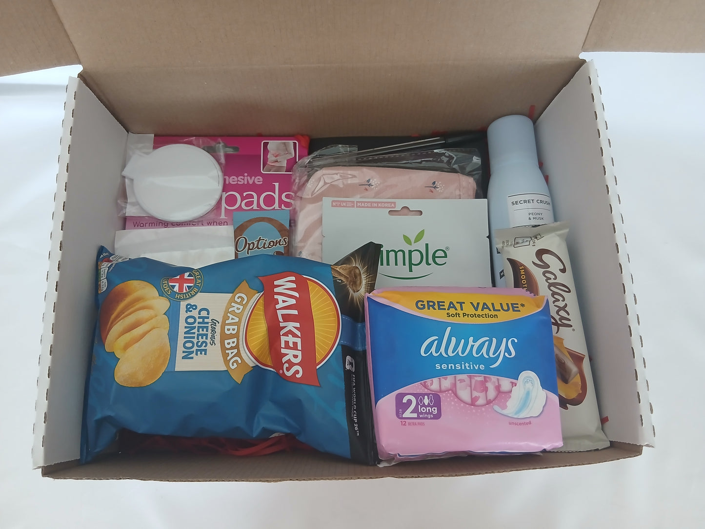 Her first- (gold tier) period hamper